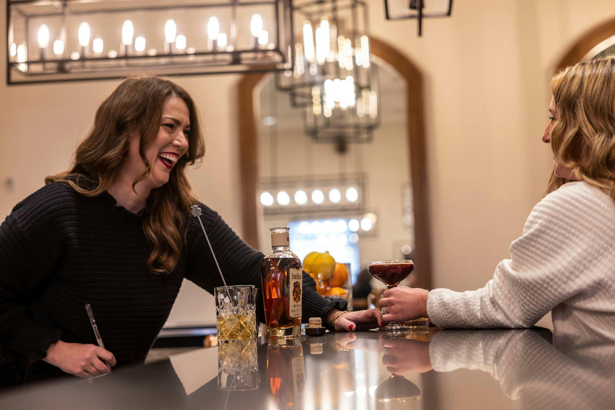 Our mixologist serving a guest at Bar 1888 inside the Visitors Center.