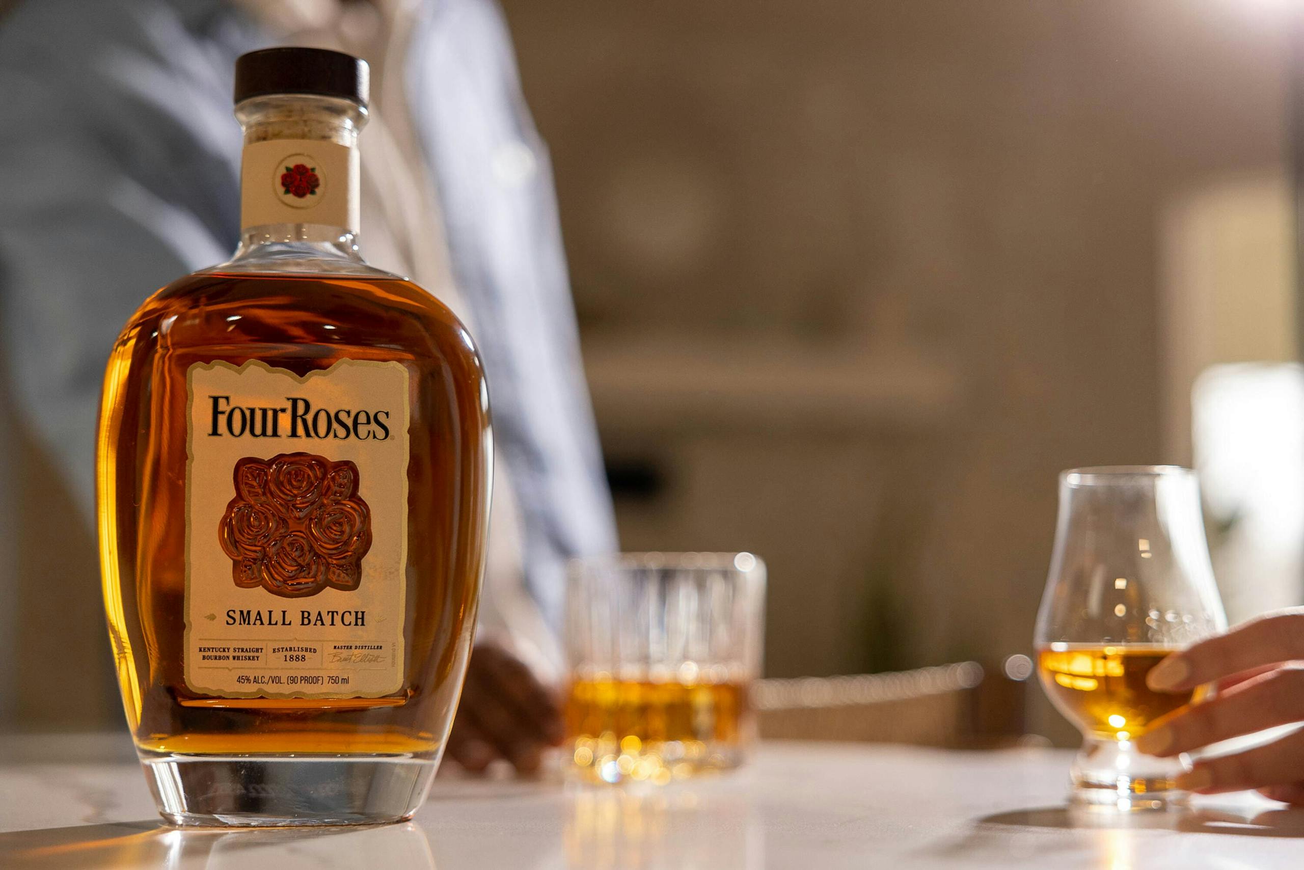 Couple chatting over Four Roses Small Batch